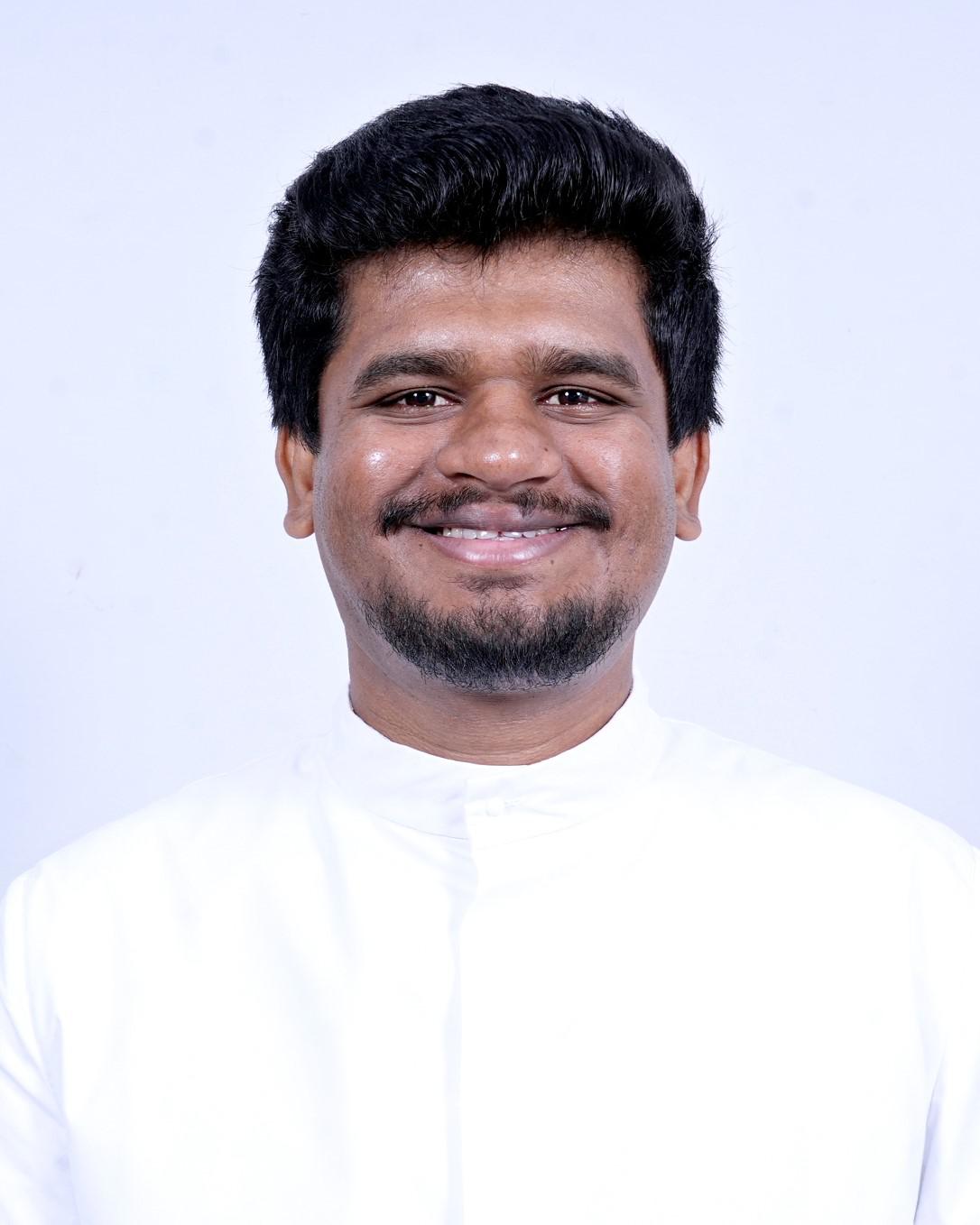 Rev.  Fr. Naveen Rozario